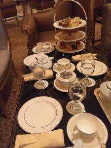 a table filled with food and tea
